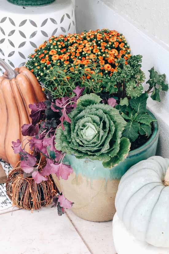 Creating a fall flower pot for your front porch.